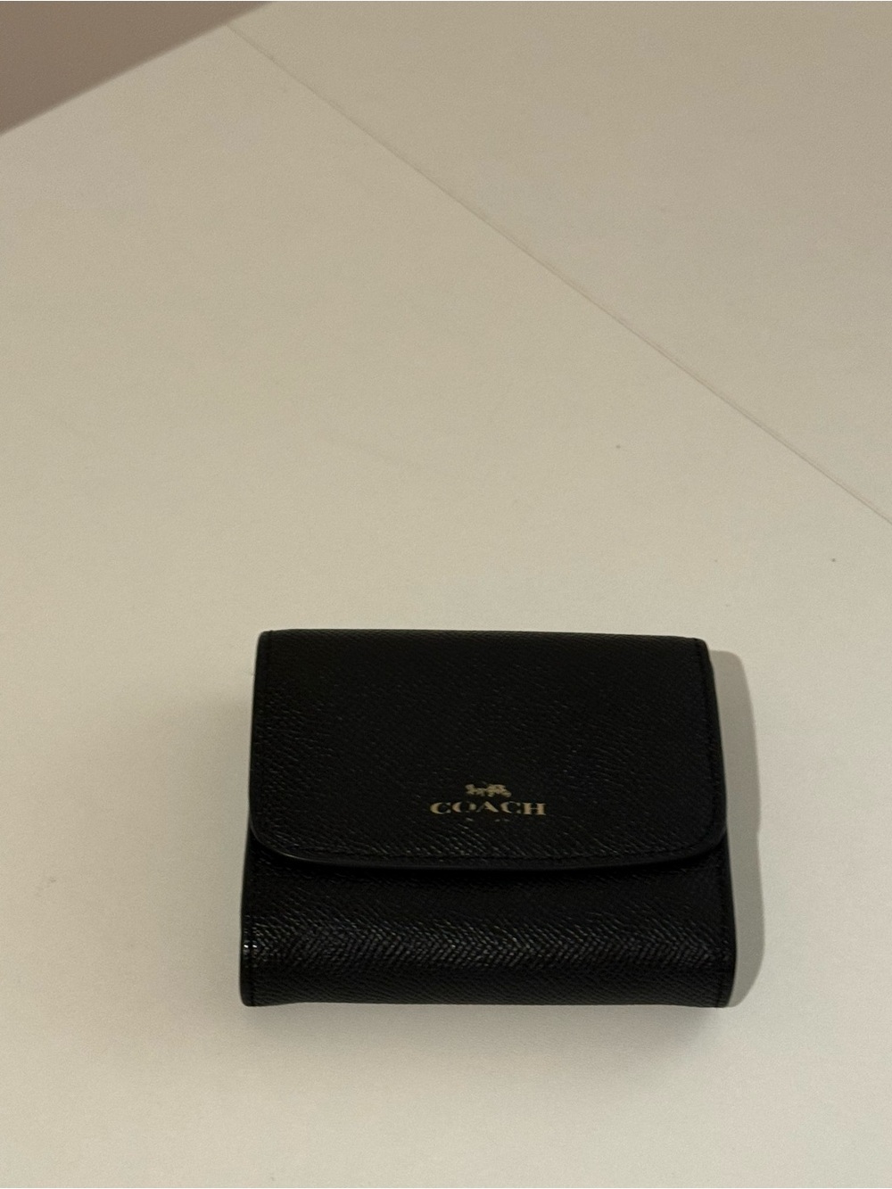 Coach Black Leather Trifold Wallet with Gold Logo